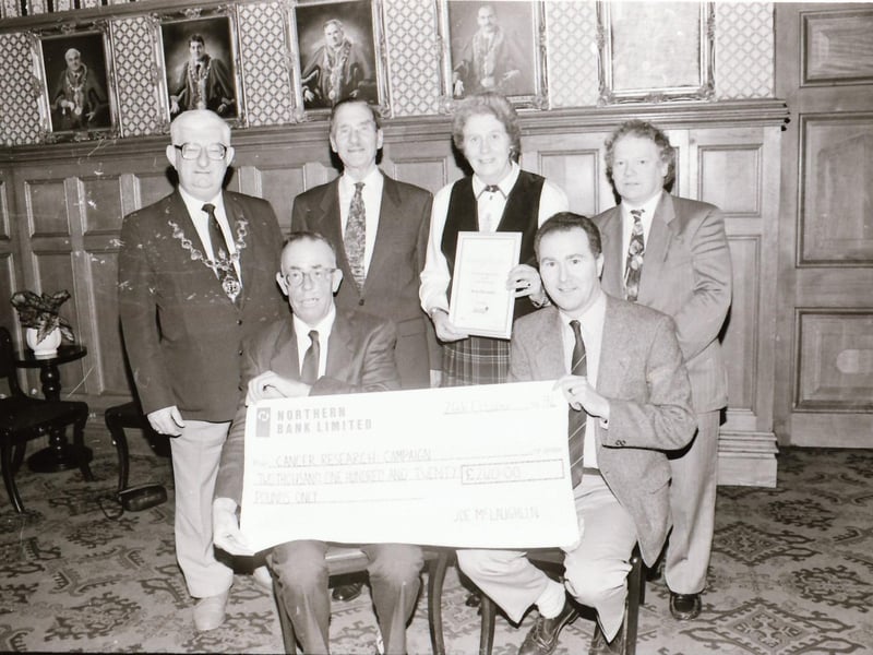 Joer McLaughlin's cheque presentation for Cancer Research.