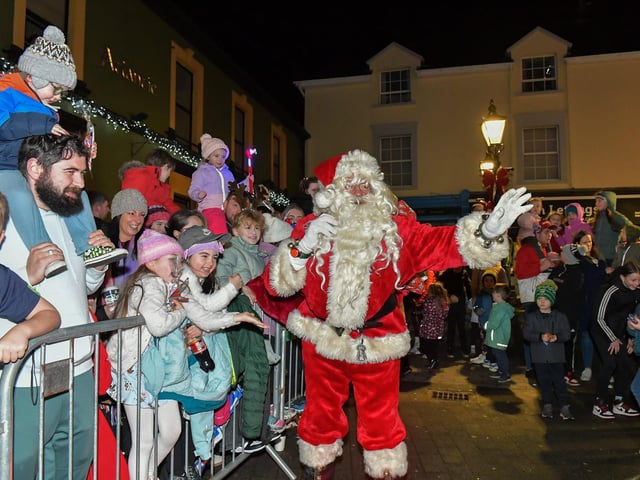 Santa arrived in Buncrana on Friday evening to meet the children and toswitch on the Christmas tree lights switch in Market Square. Photo: George Sweeney
