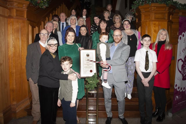 Lisa pictured with her husband, sons, family and friends after receiving the Freedom of the City at the Guildhall on Monday evening. (Photos: Jim McCafferty Photography)