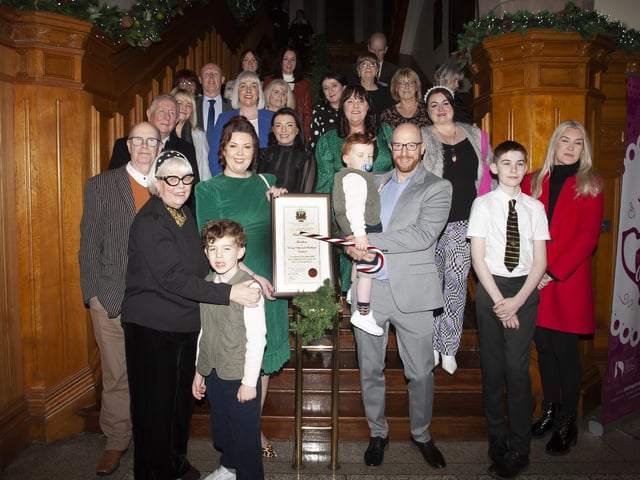 Lisa pictured with her husband, sons, family and friends after receiving the Freedom of the City at the Guildhall on Monday evening. (Photos: Jim McCafferty Photography)