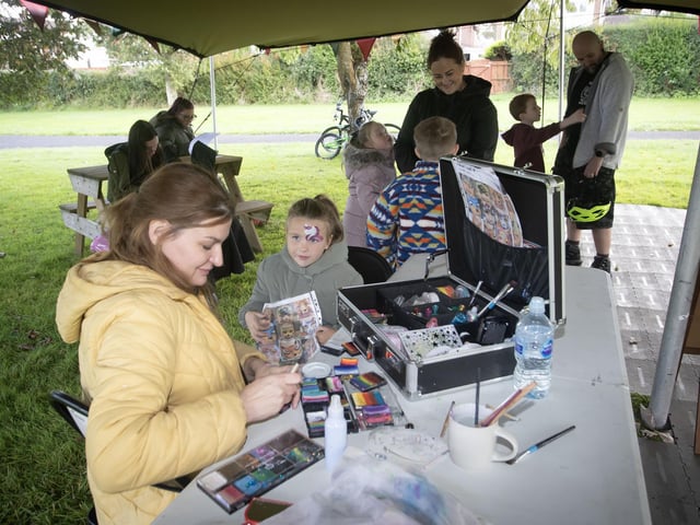 A queue for face painting during Saturday's Waterside Together Festival. : .