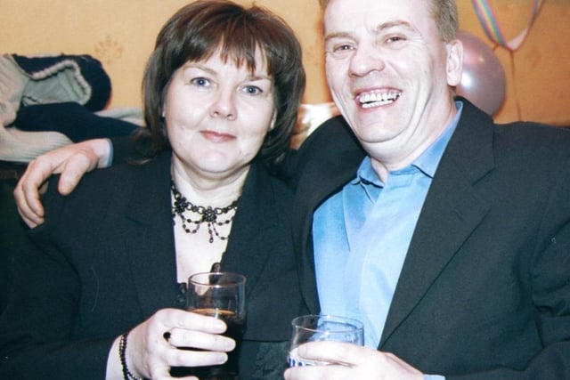 Cheers! - pictured celebrating their 25th wedding anniversary at a party in the Crescent Bar are Ann and Eddie McDonagh from Kylemore Park. 160103S9 :2003 Party Pics