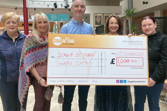 Stage Beyond Theatre Company receiving a business sponsorship cheque from McCambridge Duffy. Included are Ciaran Duffy, Director, McCambridge Duffy and Annamarie Barr, Board member of Stage Beyond