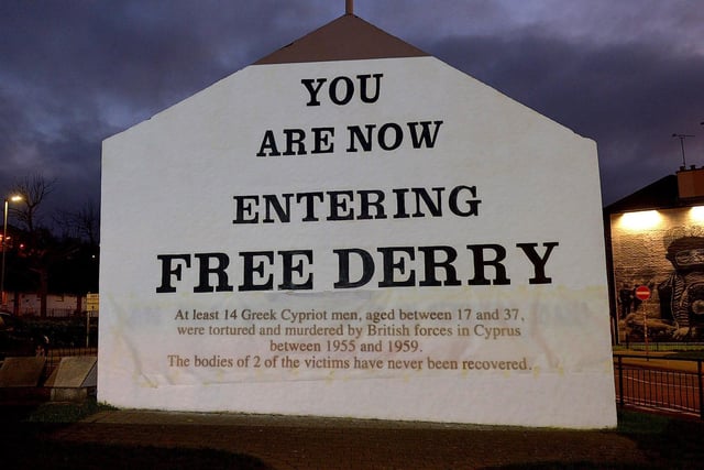 One of the projected images, on Free Derry Corner on Thursday evening, of the British colonial past from the ‘The Sun Never Set And The Blood Never Dries’ art project created by Art Everywhere.  The event was part of Bloody Sunday 51 anniversary. Photo: George Sweeney. DER2305GS – 111