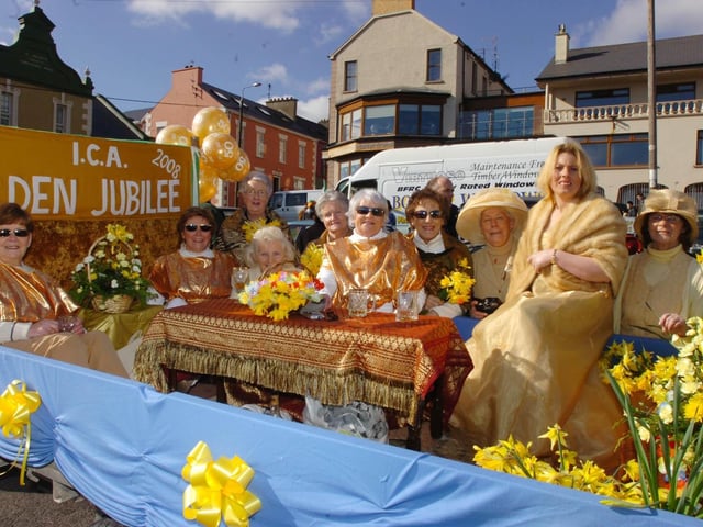 Members of Moville ICA celebrate the organisation's 50th anniversary with their float at the Moville St Patricks day parade. From left, Bridget McGuinness, Marion Boon, president, Nan McCarron, Joy McCormack, Susanna Farren, Anna Connelly, Mary Harley, Sheila Meehan and Linda McLaughlin. (1803PG13)