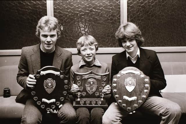 Captains of D&D Youth teams, who were winners of competitions under the NI Boys' Football Association during the year. From left, John McCloskey, Tristar FC, NIBFA, under-17 winners. Liam Coyle, Brandywell Harps, winners NIBFA, under-12, and Kevin McKeever, Tristar FC, NIBFA, undr-15 winners, at the D&D Youth FA presentations.