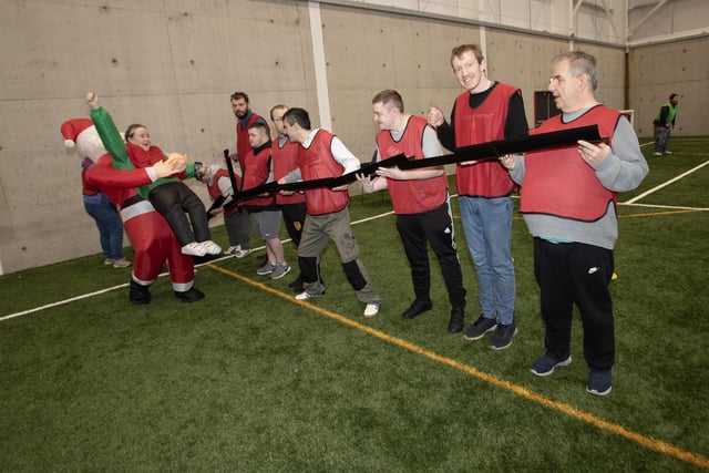 Members of the Tuned In Project taking part in their annual Christmas Cup multi-sports day at Sean Dolans GAC's new indoor astro facility in Creggan as part of International Day of Persons with Disabilities. (Photos: Jim McCafferty Photography)