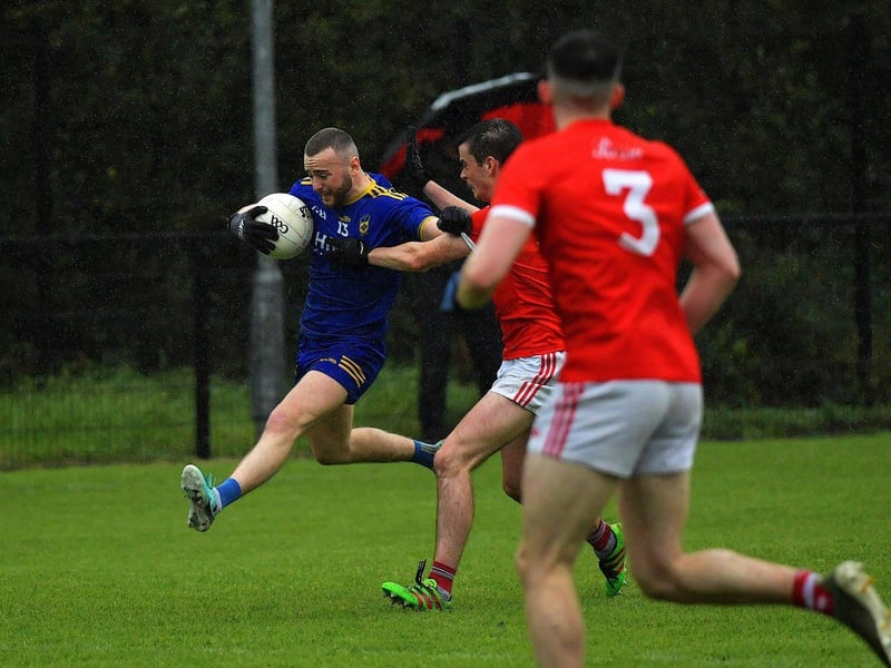 September 2023: Steelstown’s Cahir McMonagle fends off a challenge from O’Donovan Rossa’s Conor McErlain during the Senior Championship game at Pairc Brid. Photo: George Sweeney.