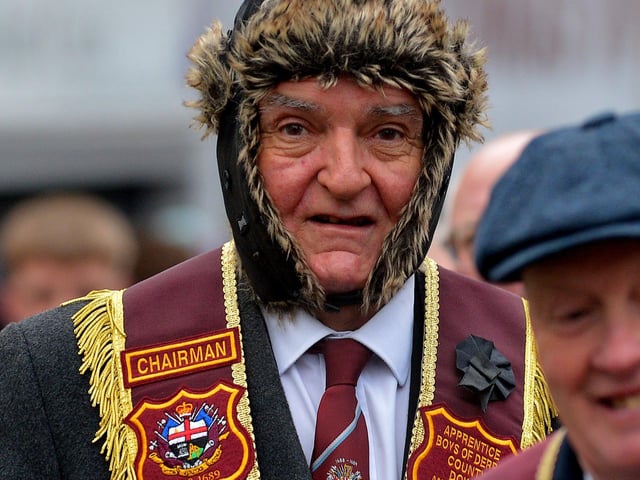 Apprentice Boy keeping warm during the Shutting of the Gates parade held in the Londonderry on Saturday last. Photo: George Sweeney