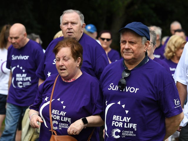 Almost one hundred cancer survivors took part in an inspiring Lap of Honour around St Columb’s running track prior to 40 fund-raising teams beginning the opening laps of the  24 hour Legenderry Relay for Life.  Photo: George Sweeney.