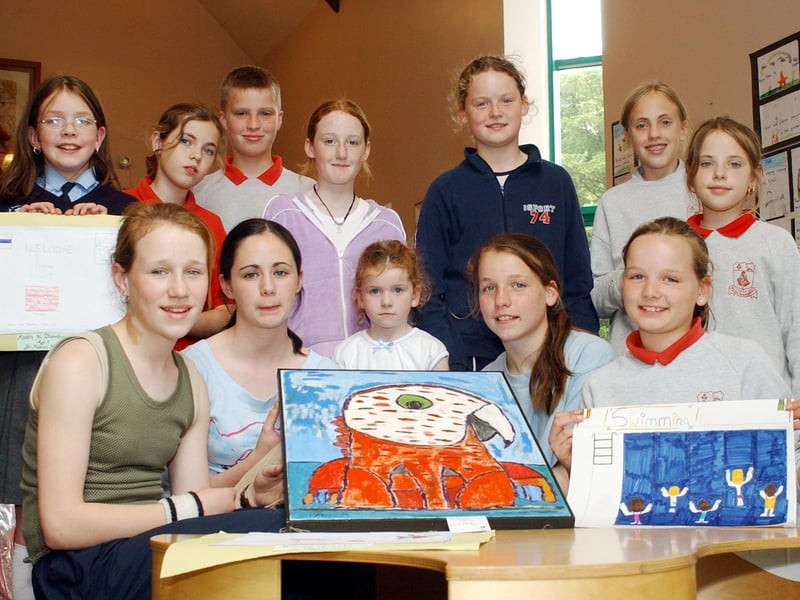 Students from Buncrana at the Library displaying paintings for the Special Olympics Share a Feeling Exhibition. Front, from left, Martina Mullan, Joanne McCallion, Arlene Crossan, Roisin and Ciara Neary. Back, from left, Sarah Louise Kelly, Aoibheann McColgan, William McDaid, Suzanna Kearney, Grainne Neary, Miriam Stainsby and Sinead McColgan.