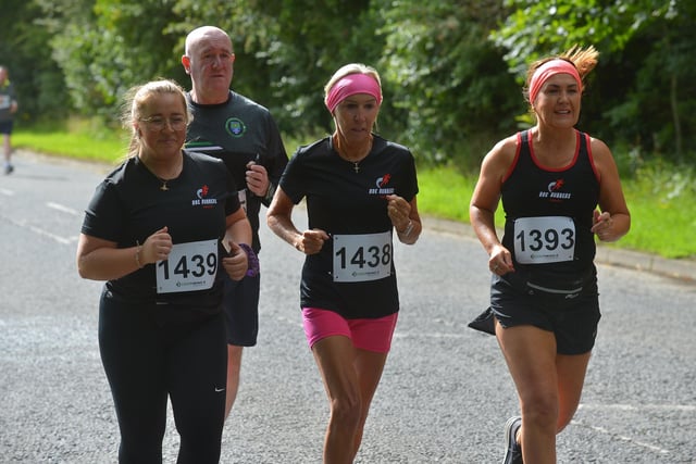 Jessica Morgan (1437), Paula Morgan (1438) and Sylvia McCay (1393) compete in the Eglinton Runners charity 5K race at Campsie on Sunday morning. Photo: George Sweeney. DER2331GS - 18