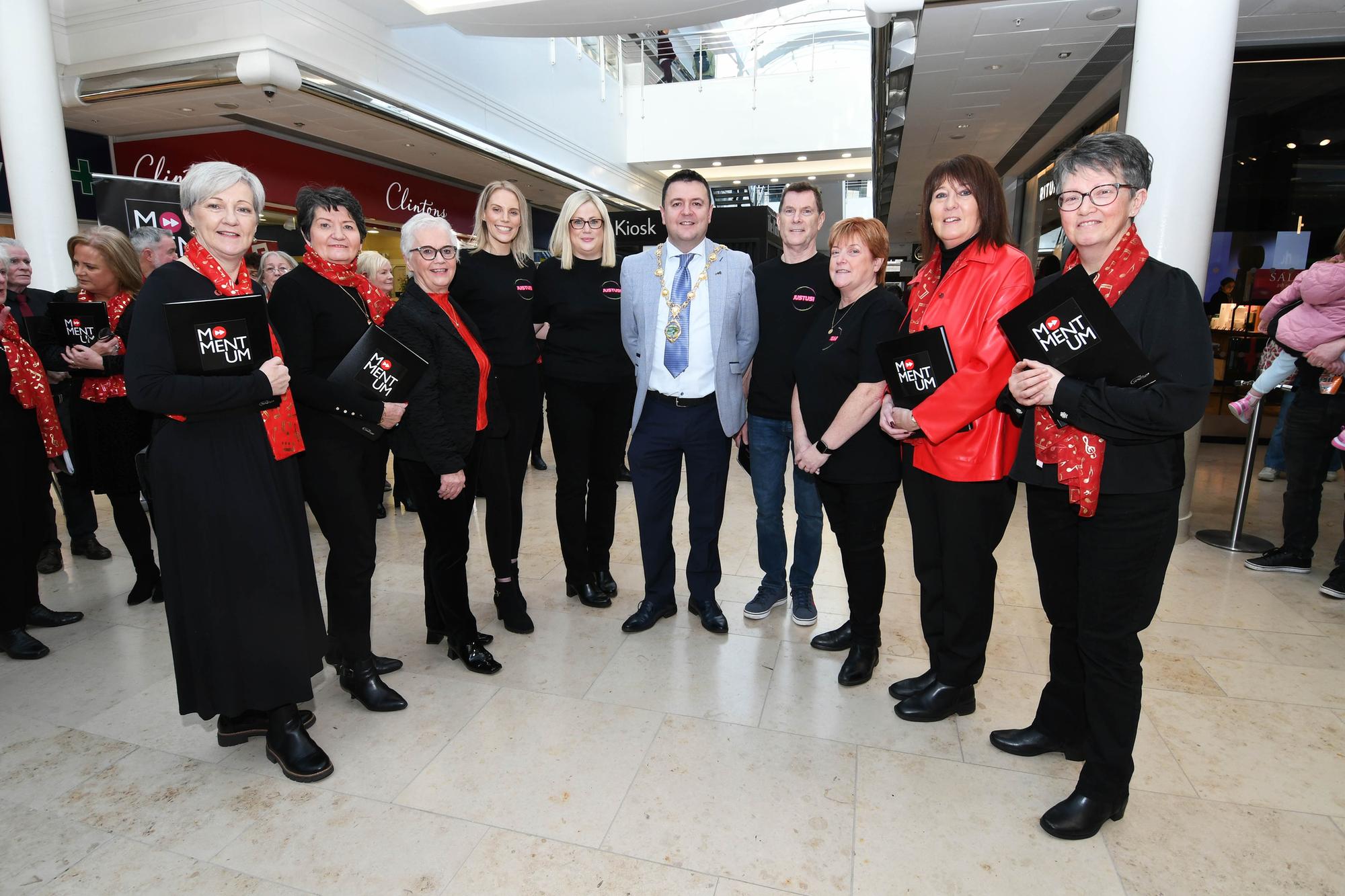 The Mayor of Derry & Strabane, Councillor Ruairi McHugh, pictured with representatives from the Just Us Choir, from Enniskillen, and the local Momentum Community Choir, when they performed in the Foyleside Shopping Centre on Saturday, from left, Lorraine Bankhead, Anne Douglas, Siobhan Heaney, Momentum Community Choir, Shelley Cowan, founder, Tracey Lucia Farry, Treasurer, Graham Kent, Chairman, Caroline Bogue, Secretary, Just Us Choir, Donna Lough and Rosemary Duffy, Momentum Community Choir.