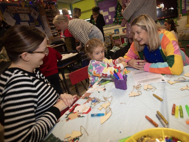 Having fun during arts and crafts at Oakgrove's Open Day on Thursday. : .