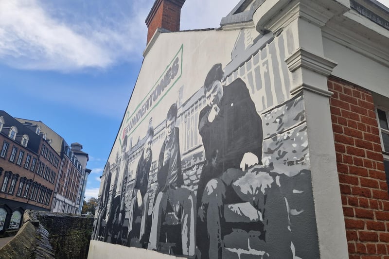 The new work by Karl Porter of UV Arts is located on the gable wall of Greg McCartney’s and Kevin Casey’s solicitors’ offices at Castle Gate and looks onto the Derry Walls and Magazine Street.