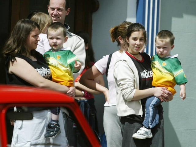 These young Donegal supporters were getting ready for an upcoming clash with Armagh in Dublin when they enjoyed the sunshine at the vintage rally in Moville in 2004. (0607JB33)