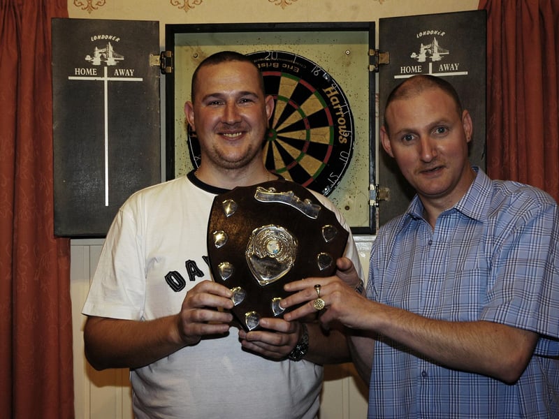 Mary B`s darts pair winners from left standing in for Amer Quiambad is James Clancy and Eamon Rodgers.