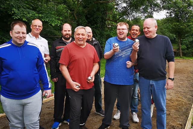 Participants at the new French Boules court created at St Columb's Park.