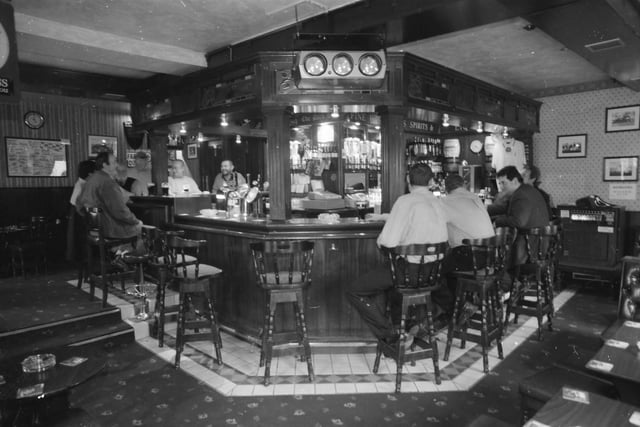 Punters enjoying a pint and a chat in the Park Bar. The pub celebrated its 100th anniversary in October 1999.