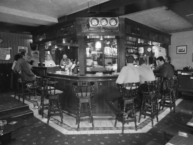 Punters enjoying a pint and a chat in the Park Bar. The pub celebrated its 100th anniversary in October 1999.