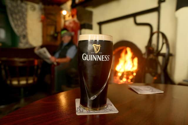 A pint of Guinness. (Photo credit should read PAUL FAITH/AFP via Getty Images)