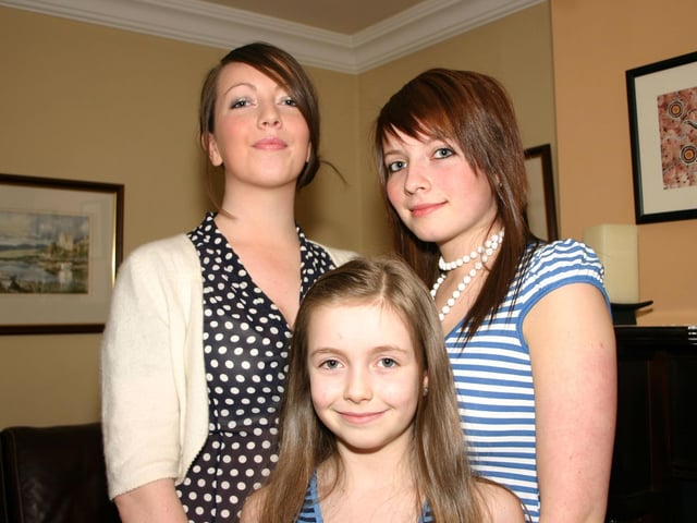 Birthday girl Aoife right with sisters Eimear and Erin pictured at home before setting off to the party. 3647/dd : Parties in Derry in Spring 2006.