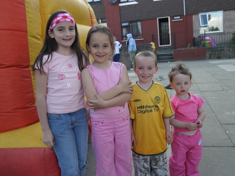 Friends together on the bouncy castle.