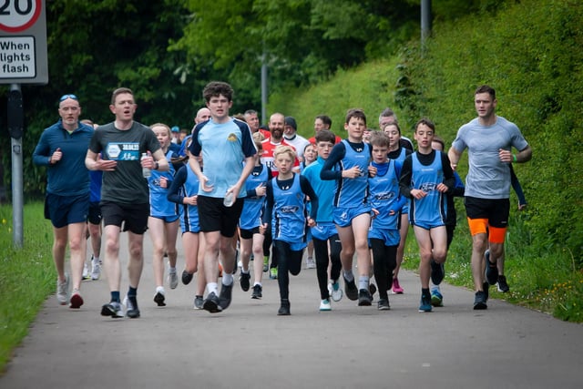 Runners from Hollybush PS cross country team lead the way down Culmore Road  in Friday’s School Run Challenge. (Photos: Jim McCafferty Photography)