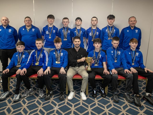 Special guest Stephen McKendry presenting Oxford United U-14ss with their trophies at the Annual D&D Youth FA awards on Friday night. Included are coaches Ruairi Dalzell, Shaun Whoriskey and David McGeady. (Photos: Jim McCafferty Photography)