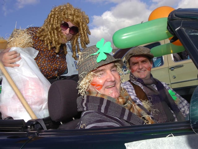 The Podge and Rodge gang, from left, Daniel, Brian and Kevin Harkin, hit the streets of Moville during the St Patricks day parade. (1803PG14)