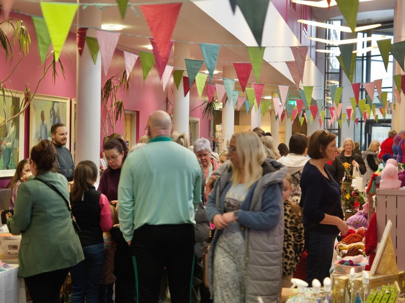 People enjoying the St. Mary's College Christmas Fair.