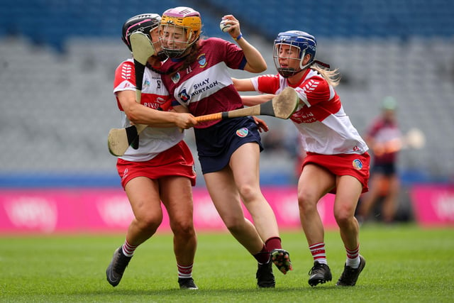 Derry’s Niamh Quinn and Dervela O’Kane with Caoimhe McCrossan of Westmeath during Sunday's Very Camogie League Division 2A Final in Croke Park. (Photo: INPHO/Ryan Byrne).