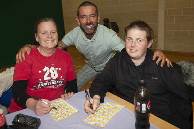 Mum and daughter Ann and Karen Carlin pictured with Mickey Doherty at the bingo.