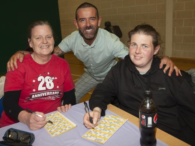Mum and daughter Ann and Karen Carlin pictured with Mickey Doherty at the bingo.