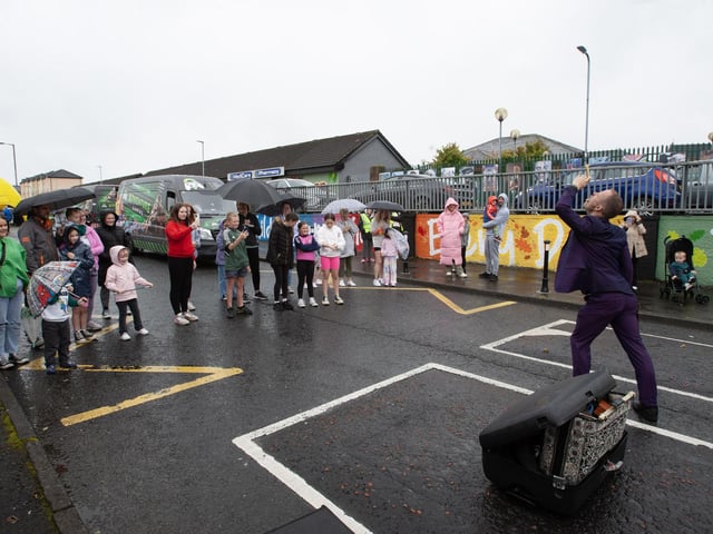 WAN BIG STREET PARTY!. . . . .A Swordswallower - one of the many attractions at Féile's 23 'Wan Big Street Party' at Central Drive, Creggan on Tuesday afternoon. (Photos: Jim McCafferty Photography)