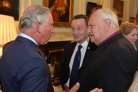 Ian Jeffers and Rt. Rev. the Lord Robin Eames with the then Prince Charles in 2015. Mr. Jeffers, who stands down as victims commissioner on Friday, has echoed the former Bishop of Derry and Raphoe's call for compensation for those bereaved during the Troubles. Photo by Aaron McCracken/Harrisons 07778373486