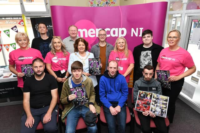 The Mayor, Councillor Patricia Logue pictured with staff and contributors at the launch of the 'All About Us' comic book by Mencap NI at their Bishop Street offices recently. Included are, from left, seated, Chris, Odhran, Conor and Liam, standing, Maureen Clarke, Ryan, Ruth Brolly, Nigel McAllister, Service Manager, Danny McLaughlin, Revolve Comics, Hayley Devine, Christopher and Elaine Mullen.