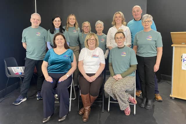 Staff of Hive Cancer Support pictured with members of Team Sorcha after announcing a bursary for PHD students undertaking gynaecological cancer research.