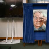 John Hume Jnr. unveils the official portrait his father, Nobel Prize winner John Hume in the House of Commons. ©UK Parliament/Jessica Taylor