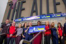 Mayor of Derry City and Strabane District Council, Councillor Lilian Seenoi-Barr, launching the new route for 2025 Strabane Lifford Half Marathon at the Alley Theatre with previous winner Clare McGuigan and members of Lifford Strabane AC and Melvin Runners. Registrations are open now at derrystrabane.com/slhm.