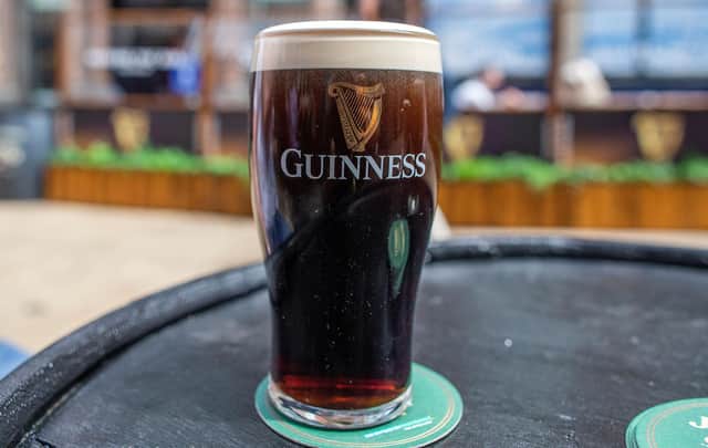 A freshly poured pint of Guinness is pictured in Dublin, on June 7, 2021, as bars, restaurants and cafes resumed outdoor service as part of the latest lifting of Covid-19 restrictions. (Photo by PAUL FAITH/AFP via Getty Images)