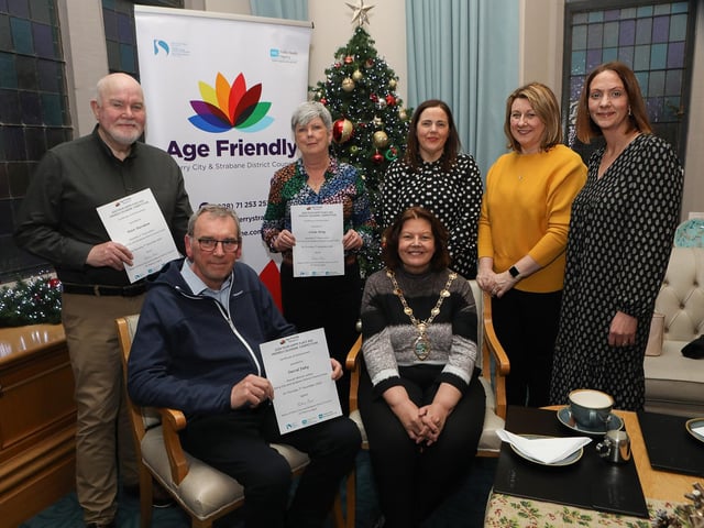 Mayor Patricia Logue with prizewinners in the Age Friendly "Your Happy Place" competition, at a reception held in the Mayor's Parlour. Seated is David Fahy, winner. Standing, from left, are Peter Davidson, 2nd place, Linga Ming, 3rd place, Ciara Burke, Age Friendly co-ordinator, Sonia Montgomery, WHSCT, and Heather Hamilton, Public Health Agency. Derry City and Strabane District Council has joined up with the councils in Fermanagh and Omagh and Causeway Coast and Glens, South West Age Partnership along with the Western Health and Social Care Trust and the Public Health Agency to produce the 2024 Age Friendly Calendar and people were asked to submit pictures of their happy place. (Photo - Tom Heaney, nwpresspics)