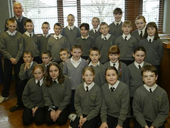 Mr B O'Donnell with students from St Paul's, Slievemore Primary School.
