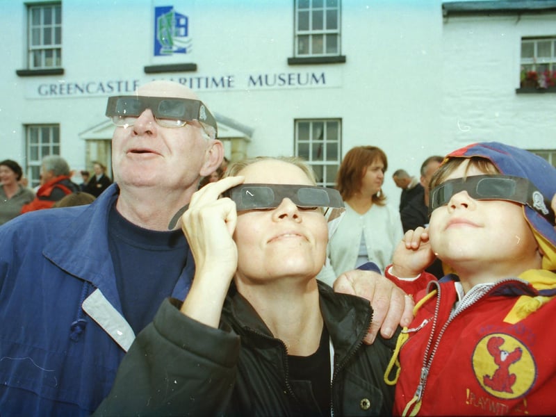 Eclipse watchers young and old sun-gazing at the Greencastle Maritime Museum.