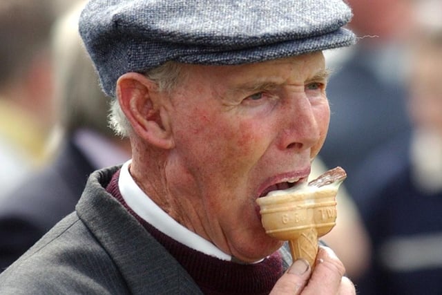 James McGeoghegan, from Milltown, Carndonagh, tucks into a cool ice cream.