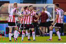 Dom Thomas, centre, celebrates with teammates after scoring a 90th minute equaliser at Sullivan & Lambe Park in Drogheda, Louth. Photo by Ramsey Cardy/Sportsfile