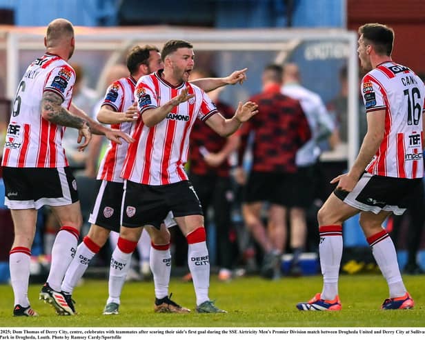 Dom Thomas, centre, celebrates with teammates after scoring a 90th minute equaliser at Sullivan & Lambe Park in Drogheda, Louth. Photo by Ramsey Cardy/Sportsfile
