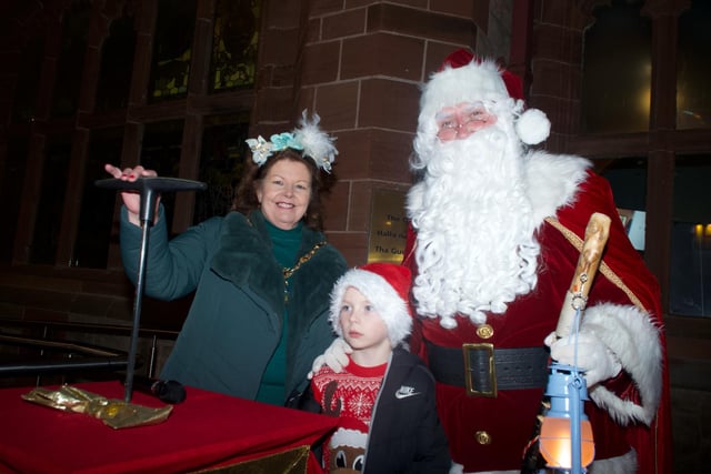 The Mayor Patricia Logue with Santa and one of the thousands of young people who gathered for the event.