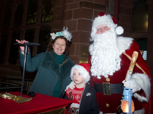 The Mayor Patricia Logue with Santa and one of the thousands of young people who gathered for the event.