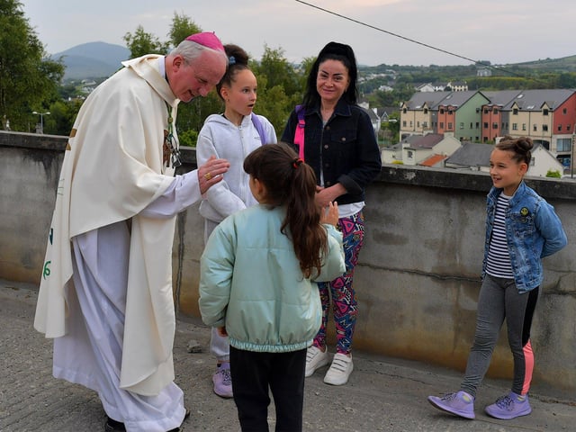The Most Reverend Dr Donal McKeown blessing parishioners in the grounds of Church of the Sacred Heart, Carndonagh, on Saturday evening, after a mass to celebrate Fr Con McLaughlin’s Golden Jubilee in the priesthood. Photo: George Sweeney. DER2323GS – 171